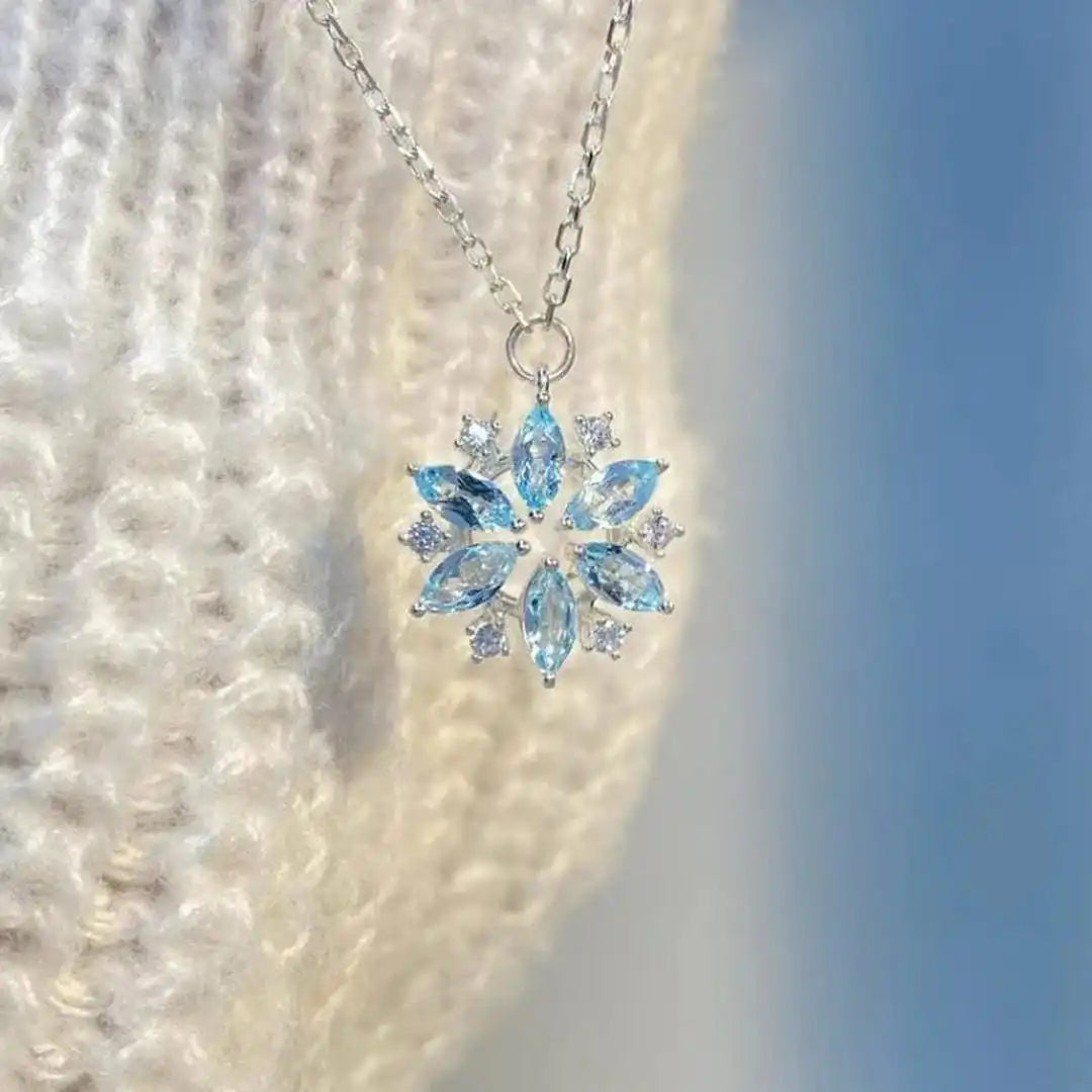White Gold Blossom Pendant Necklace with Blue Snowflake