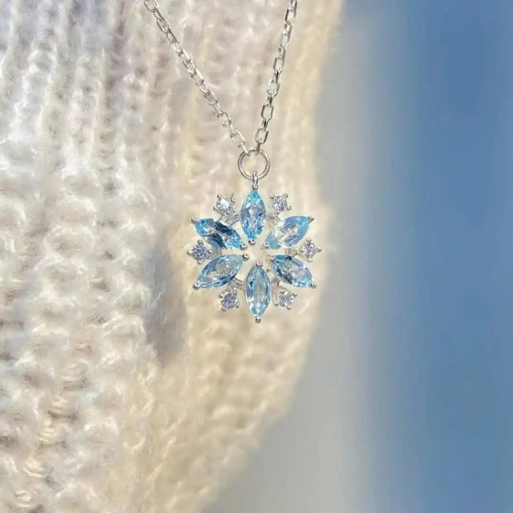 White Gold Blossom Pendant Necklace with Blue Snowflake