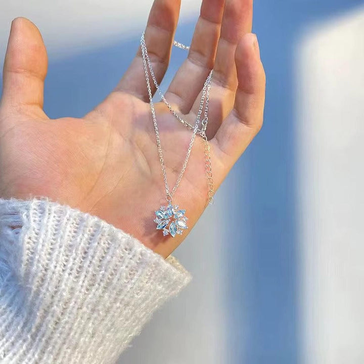 White Gold Blossom Pendant Necklace with Blue Snowflake