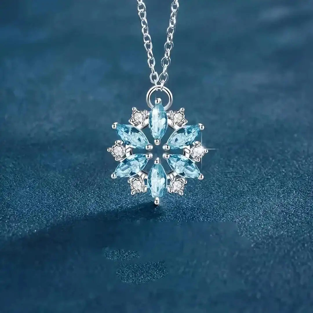 White Gold Blossom Pendant Necklace with Blue Snowflake